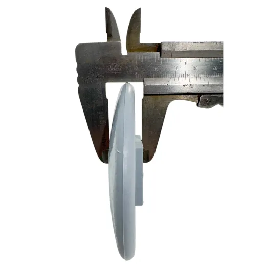 Seitenansicht der grauen Kunststoff-Abweiserrolle mit Schieblehre - Dicke ca. 18 mm, Au�endurchmesser 95 mm, f�r Vierkantrohr 25x25 mm. Ersatzteil f�r Hupfer Regalwagen, Tablettwagen und Allzweckwagen - passend auch f�r Rieber, Blanco, B-pro, Allpax.